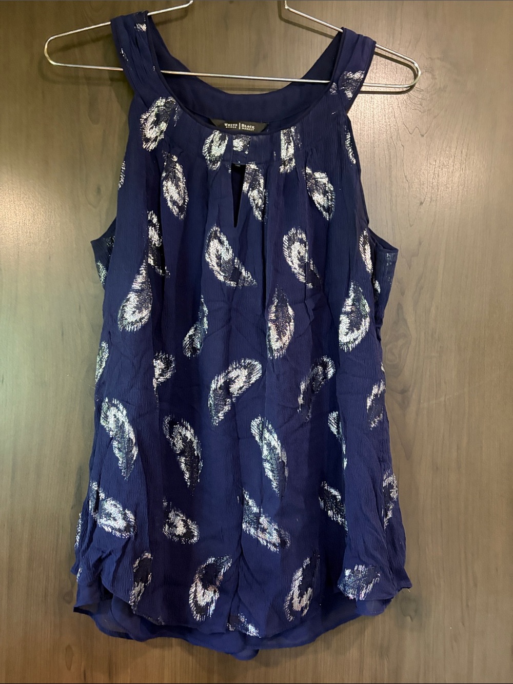 White House black market silk top with metallic feathers key hole neckline M
